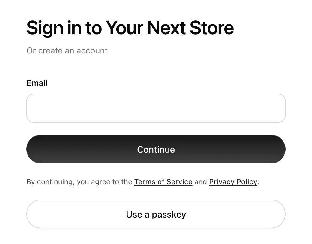 The id.yns.store sign-in page with an Email field, Continue, and Use a passkey