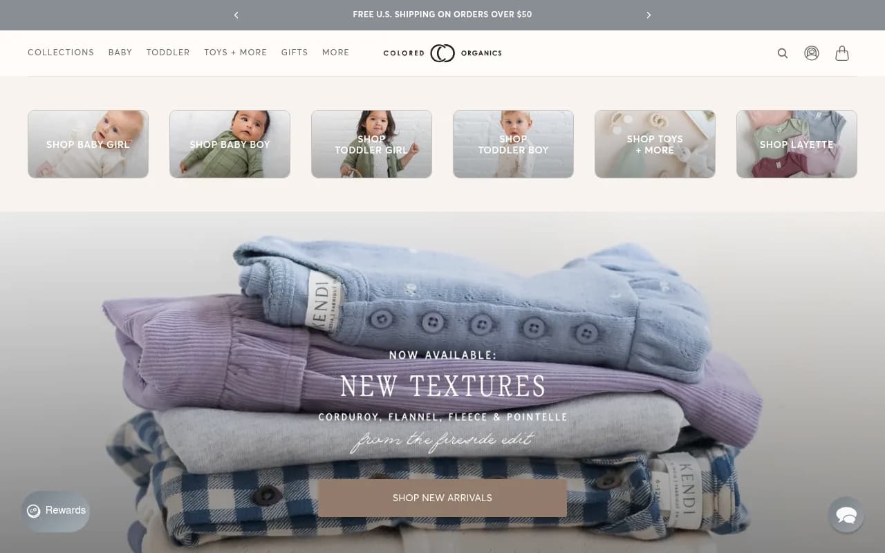 Colored Organics homepage with organic baby and toddler collections and a muted, neutral palette